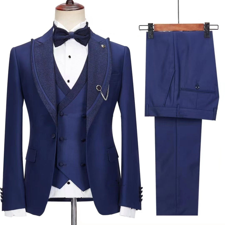 Jesse Trendy Dark Blue Peak Lapel Three-Piece Prom Suit