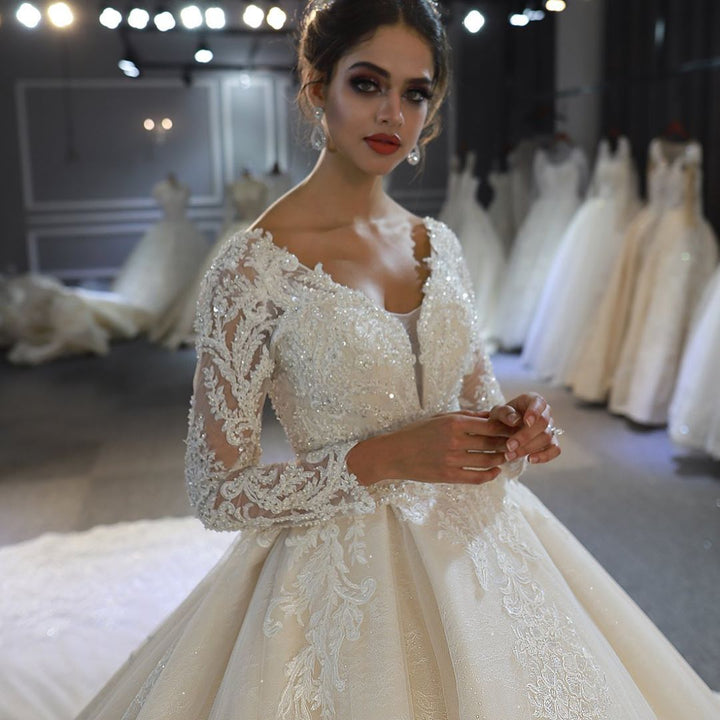 Bmbride Elegant Train A-Line Sweetheart Backless Long Sleeve Appliques Lace Sequins Bridal Gown